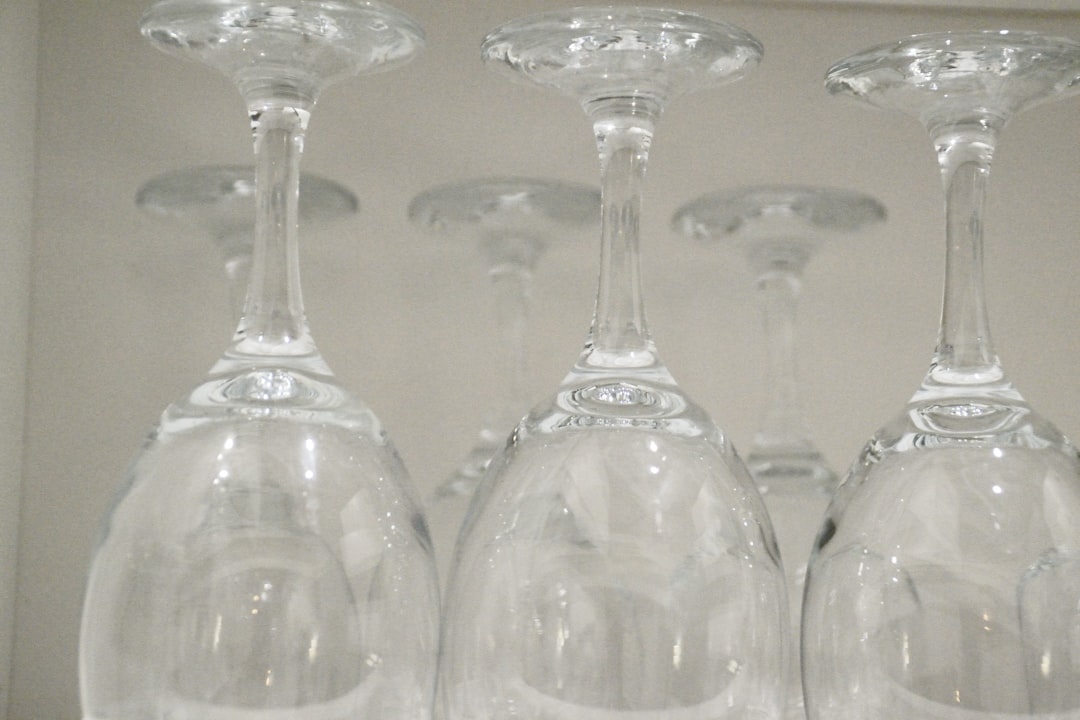 flexible packaging vs rigid packaging - Several clear wine glasses upside down