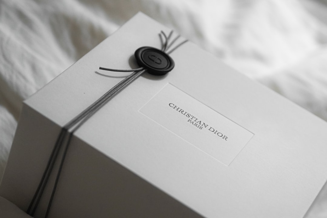 luxury packaging design - White dior gift box with wax seal and ribbon