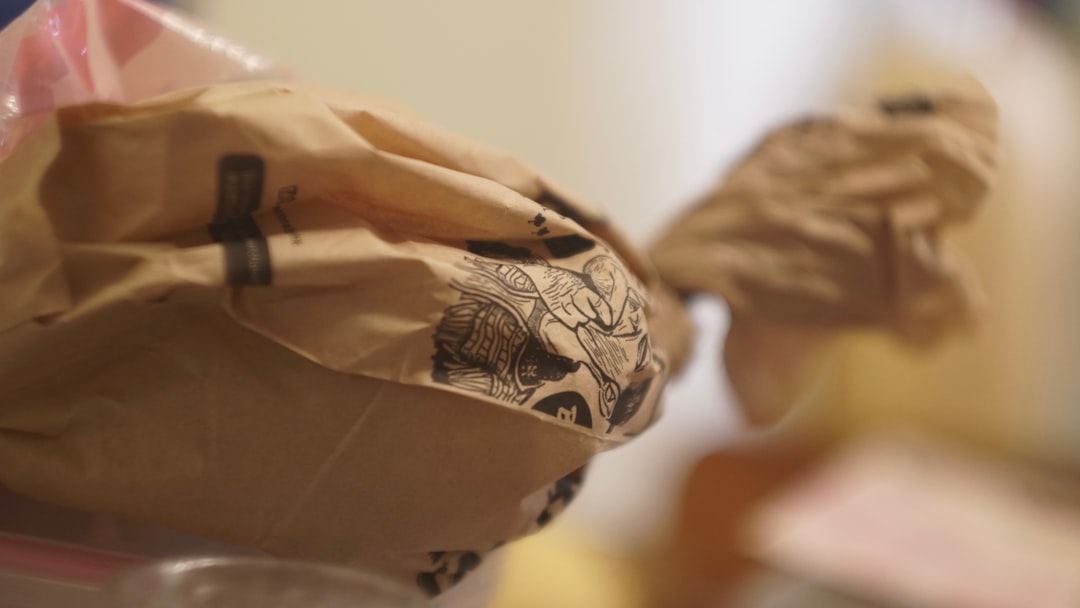 Brown paper bag with black markings on surface