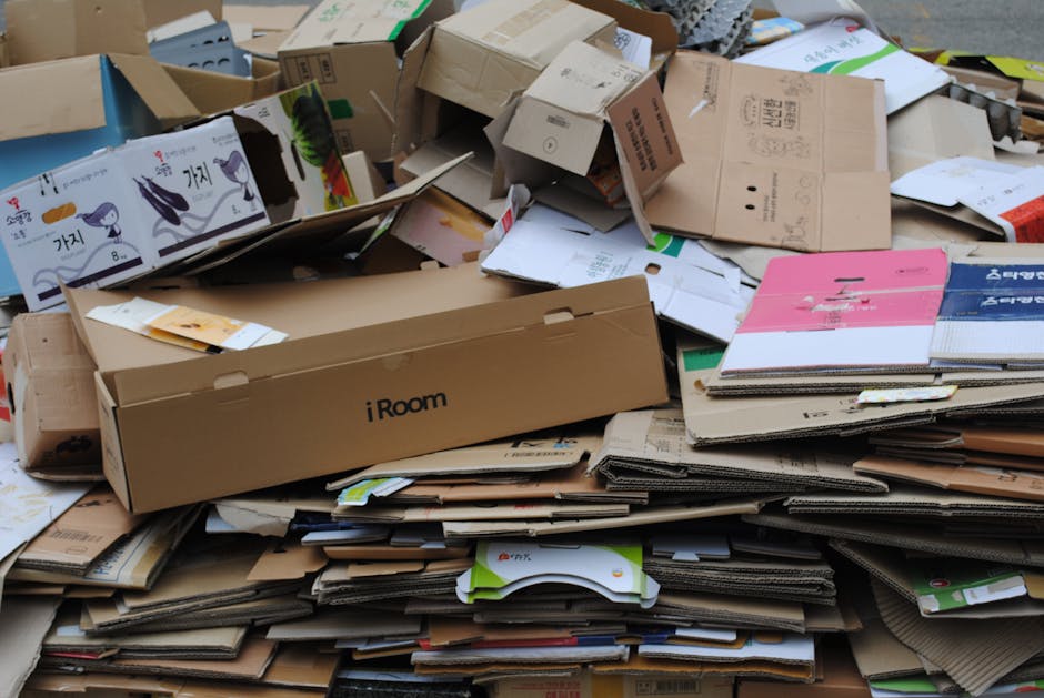 packaging news April 2026 - Pile of used cardboard boxes for recycling, ideal for environmental themes.